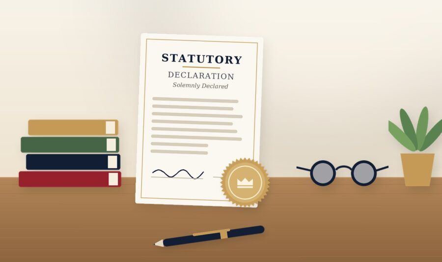 Statutory declaration with books, reading glasses and a plant